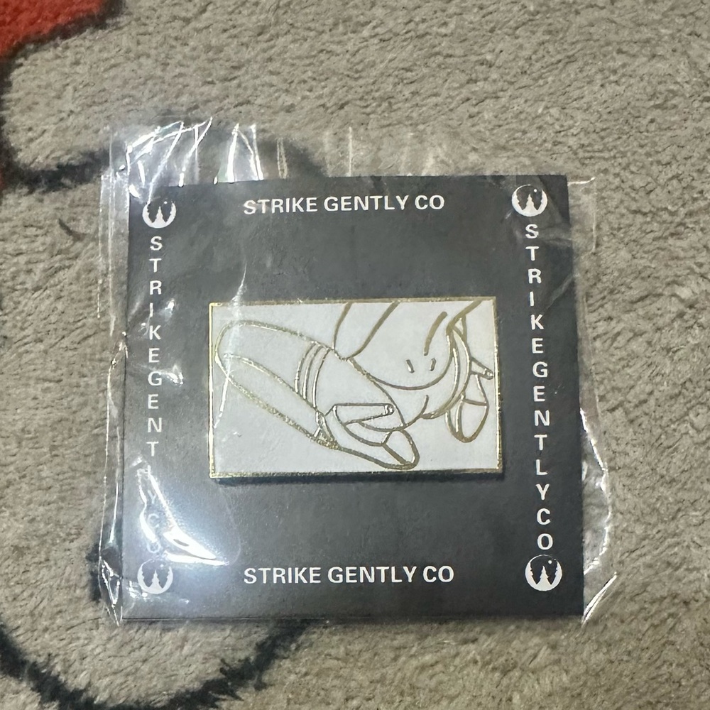 Strike Gently Co Enamel Pin